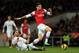 LONDON, ENGLAND - DECEMBER 01: Olivier Giroud of Arsenal goes down when challenged by Chico of Swansea during the Barclays Premier League match between Arsenal and Swansea City at the Emirates Stadium on December 1, 2012 in London, England. (Photo by Richard Heathcote/Getty Images)