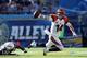 SAN DIEGO, CA - DECEMBER 02: Quarterback Andy Dalton #14 of the Cincinnati Bengals tosses the ball after being tackled by linebacker Demorrio Williams #58 of the San Diego Chargers at Qualcomm Stadium on December 2, 2012 in San Diego, California. (Photo by Jeff Gross/Getty Images)