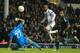 Jermain Defoe watches his chipped effort go in the Panathinaikos net, sealing Tottenham's progress in the Europa League.