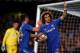 LONDON, ENGLAND - DECEMBER 05: David Luiz of Chelsea celebrates with teammate Gary Cahill (L)after scoring the opening goal from the penalty spot during the UEFA Champions League group E match between Chelsea and FC Nordsjaelland at Stamford Bridge on December 5, 2012 in London, England. (Photo by Clive Rose/Getty Images)