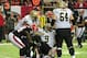ATLANTA, GA - NOVEMBER 29: Drew Brees #9 of the New Orleans Saints is helped to his feet after being hit by Kroy Biermann #71 of the Atlanta Falcons at the Georgia Dome on November 29, 2012 in Atlanta, Georgia (Photo by Scott Cunningham/Getty Images)