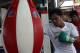 GENERAL SANTOS, PHILIPPINES - SEPTEMBER 27: Manny Pacquiao uses punch bag during a training session at Golingan Gymnasium on September 27, 2012 in General Santos, Philippines. Pacquiao will take on Mexican Juan Manual Marquez on December 8, 2012 in Las Veg2as. (Photo by Jeoffrey Maitem/Getty Images)
