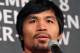 BEVERLY HILLS, CA - SEPTEMBER 17: Boxer Manny Pacquiao addresses the media audience from the podium during the Manny Pacquiao v Juan Manuel Marquez - Press Conference at Beverly Hills Hotel on September 17, 2012 in Beverly Hills, California. (Photo by Victor Decolongon/Getty Images)