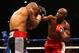 LAS VEGAS, NV - MAY 05: (R-L) Floyd Mayweather Jr. throws a right to the head of Miguel Cotto during their WBA super welterweight title fight at the MGM Grand Garden Arena on May 5, 2012 in Las Vegas, Nevada. (Photo by Al Bello/Getty Images)