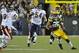 GREEN BAY, WI - DECEMBER 25: Ryan Grant #25 of the Green Bay Packers is pursued by Brian Urlacher #54 and Major Wright #27 of the Chicago Bears on December 25, 2011 at Lambeau Field in Green Bay, Wisconsin. (Photo by David Banks/Getty Images)