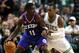 Nov 9, 2012; Boston, MA, USA; Philadelphia 76ers point guard Jrue Holiday (11) dribbles the ball against Boston Celtics point guard Rajon Rondo (right) during the second half at TD Garden. Mandatory Credit: Mark L. Baer-USA TODAY Sports