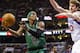 Dec 07, 2012; Philadelphia, PA, USA; Boston Celtics guard Rajon Rondo (9) shoots as Philadelphia 76ers center Spencer Hawes (00) defends during the second quarter at the Wachovia Center. Mandatory Credit: Howard Smith-USA TODAY Sports