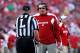 Bret Bielema checks in with the referee, possibly to use a timeout.
