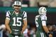 EAST RUTHERFORD, NJ - NOVEMBER 22: Quarterbacks Tim Tebow #15 and Mark Sanchez #6 of the New York Jets before the start of their game against the New England Patriots at MetLife Stadium on November 22, 2012 in East Rutherford, New Jersey. (Photo by Rich Schultz /Getty Images)