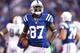 INDIANAPOLIS, IN - NOVEMBER 04: Reggie Wayne #87 of the Indianapolis Colts celebrates after making a nine-yard touchdown reception against the Miami Dolphins during the game at Lucas Oil Stadium on November 4, 2012 in Indianapolis, Indiana. (Photo by Joe Robbins/Getty Images)