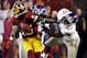 Dec 3, 2012; Landover, MD, USA; Washington Redskins wide receiver Josh Morgan (15) stiff arms New York Giants strong safety Stevie Brown (27) during the game at FedEx Field. Mandatory Credit: Andrew Mills/THE STAR-LEDGER via USA TODAY Sports