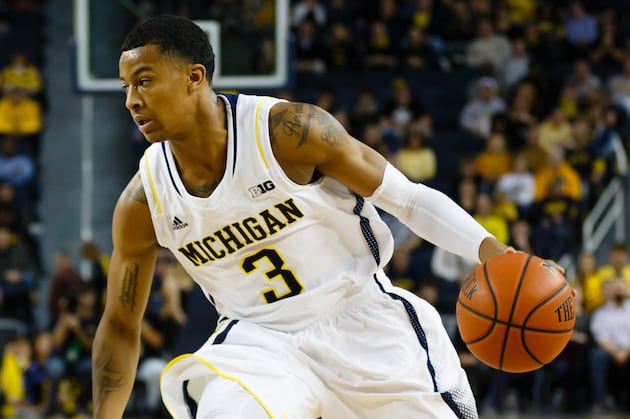 Trey Burke Shrugs off His Rim-Hanging Technical
