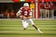 LINCOLN, NE - NOVEMBER 10: Quarterback Taylor Martinez #3 of the Nebraska Cornhuskers runs with the ball against the Penn State Nittany Lions defense during their game at Memorial Stadium on November 10, 2012 in Lincoln, Nebraska. Nebraska beat Penn State 32-23. (Photo by Eric Francis/Getty Images)