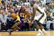 November 7, 2012; Salt Lake City, UT, USA; Los Angeles Lakers shooting guard Kobe Bryant (24) dribbles toward the basket while defended by Utah Jazz power forward Paul Millsap (24) during the first half at EnergySolutions Arena. Mandatory Credit: Russ Isabella-USA TODAY Sports