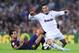 BARCELONA, SPAIN - OCTOBER 07: Cristiano Ronaldo of Real Madrid CF (R) is brought down by Sergio Busquets of FC Barcelona during the La Liga match between FC Barcelona and Real Mdrid CF at Camp Nou on October 7, 2012 in Barcelona, Spain. (Photo by David Ramos/Getty Images)