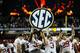ATLANTA, GA - DECEMBER 01: Members of the Alabama Crimson Tide celebrate after defeating the Georgia Bulldogs 32-28 to win the SEC Championship Game at the Georgia Dome on December 1, 2012 in Atlanta, Georgia. (Photo by Kevin C. Cox/Getty Images)