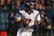 CHICAGO, IL - NOVEMBER 25: Christian Ponder #7 of the Minnesota Vikings rolls out to look for a receiver against the Chicago Bears at Soldier Field on November 25, 2012 in Chicago, Illinois. The Bears defeated the Vikings 28-10. (Photo by Jonathan Daniel/Getty Images)