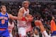 Dec 8, 2012; Chicago, IL, USA; Chicago Bulls center Joakim Noah (13) pulls down a rebound in front of New York Knicks point guard Pablo Prigioni (9) during the second quarter at the United Center. Mandatory Credit: Dennis Wierzbicki-USA TODAY Sports