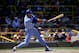 1990: Bo Jackson #16 of the Kansas City Royals watches the flight of the ball as he follows through on his swing during a game in the 1990 season. (Photo by Jonathan Daniel/Getty Images)