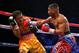 LAS VEGAS, NV - DECEMBER 08: (R-L) Yuriorkis Gamboa connects with a right to the head of Michael Farenas during their super featherweight bout at the MGM Grand Garden Arena on December 8, 2012 in Las Vegas, Nevada. (Photo by Al Bello/Getty Images)