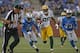 DETROIT, MI - NOVEMBER 18: Jermichael Finley #88 of the Green Bay Packers runs for a first down as Ricardo Silva #39 and Chris Houston #23 of the Detroit Lions give chase during the third quarter of the game at Ford Field on November 18, 2012 in Detroit, Michigan. The Packers defeated the Lions 24-20. (Photo by Leon Halip/Getty Images)
