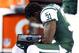 Nov. 22, 2012; East Rutherford, NJ, USA; New York Jets cornerback Antonio Cromartie (31) reads a playbook against the New England Patriots during the second half on Thanksgiving at Metlife Stadium. Patriots won 49-19. Mandatory Credit: Debby Wong-USA TODAY Sports