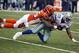 Dec 9, 2012; Cincinnati, USA; Dallas Cowboys running back DeMarco Murray (29) is brought down by Cincinnati Bengals outside linebacker Vontaze Burfict (55) during the first half at Paul Brown Stadium. Mandatory Credit: David Kohl-USA TODAY Sports