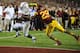 LOS ANGELES, CA - NOVEMBER 03: Kenjon Barner #24 of the Oregon Ducks runs away from Jawanza Sterling #29 of the USC Trojans at Los Angeles Memorial Coliseum on November 3, 2012 in Los Angeles, California. (Photo by Robert Laberge/Getty Images)