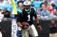 CHARLOTTE, NC - DECEMBER 09: Cam Newton #1 of the Carolina Panthers runs for a touchdown during their game against the Atlanta Falcons at Bank of America Stadium on December 9, 2012 in Charlotte, North Carolina. (Photo by Streeter Lecka/Getty Images)