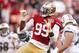 December 9, 2012; San Francisco, CA, USA; San Francisco 49ers outside linebacker Aldon Smith (99) celebrates after recording a sack against the Miami Dolphins in the fourth quarter at Candlestick Park. The 49ers defeated the Dolphins 27-13. Mandatory Credit: Cary Edmondson-USA TODAY Sports