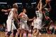 December 9, 2012; Brooklyn, NY, USA; Milwaukee Bucks center Ekpe Udoh (13) drives to the basket and is fouled by Brooklyn Nets forward Mirza Teletovic (33) during the first quarter of an NBA game at the Barclays Center. Mandatory Credit: Brad Penner-USA TODAY Sports