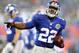 EAST RUTHERFORD, NJ - DECEMBER 09: David Wilson #22 of the New York Giants celebrates his third touchdown of the game against the New Orleans Saints on December 9, 2012 at MetLife Stadium in East Rutherford, New Jersey. (Photo by Elsa/Getty Images)