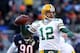 CHICAGO, IL - JANUARY 23: Quarterback Aaron Rodgers #12 of the Green Bay Packers looks to pass against the Chicago Bears in the NFC Championship Game at Soldier Field on January 23, 2011 in Chicago, Illinois. (Photo by Andy Lyons/Getty Images)