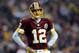 LANDOVER, MD - DECEMBER 09: Kirk Cousins #12 of the Washington Redskins reacts during the fourth quarter against the Baltimore Ravens at FedExField on December 9, 2012 in Landover, Maryland. (Photo by Patrick McDermott/Getty Images)