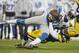 GREEN BAY, WI - DECEMBER 9: Calvin Johnson #81 of the Detroit Lions makes a catch and is tackled by Morgan Burnett #42 of the Green Bay Packers at Lambeau Field on December 9, 2012 in Green Bay, Wisconsin. (Photo by Tom Lynn /Getty Images)