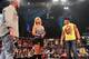 Bully Ray, Brooke and Hulk Hogan stand in the middle of the ring on Impact! Wrestling. (Photo credit: Lee South, TNA Wrestling)