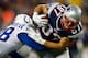 FOXBORO, MA - NOVEMBER 18: Rob Gronkowski #87 of the New England Patriots attempts to run through a tackle after catching a pass against the Indianapolis Colts during the game on November 18, 2012 at Gillette Stadium in Foxboro, Massachusetts. (Photo by Jared Wickerham/Getty Images)