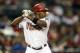 PHOENIX, AZ - OCTOBER 02: Justin Upton #10 of the Arizona Diamondbacks bats against the Colorado Rockies during the MLB game at Chase Field on October 2, 2012 in Phoenix, Arizona. The Diamondbacks defeated the Rockies 5-3. (Photo by Christian Petersen/Getty Images)