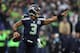 SEATTLE, WA - DECEMBER 09: Russell Wilson #3 of the Seattle Seahawks points downfield against the Arizona Cardinals in the first quarter at CenturyLink Field on December 9, 2012 in Seattle, Washington. (Photo by Kevin Casey/Getty Images)