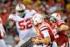 LINCOLN, NE - OCTOBER 8: Defensive lineman Johnathan Hankins #52 of the Ohio State Buckeyes takes an angle on quarterback Taylor Martinez #3 of the Nebraska Cornhuskers during their game at Memorial Stadium October 8, 2011 in Lincoln, Nebraska. Nebraska Defeated Ohio State 34-27. (Photo by Eric Francis/Getty Images)