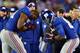 EAST RUTHERFORD, NJ - DECEMBER 09: Victor Cruz #80 of the New York Giants celebrates his touchdown with teammate Justin Tuck #91 in the fourth quarter against the New Orleans Saints on December 9, 2012 at MetLife Stadium in East Rutherford, New Jersey. (Photo by Elsa/Getty Images)