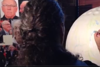 Watch a Brief Video of an Artist Painting Jim Boeheim's Image on a Golf Ball