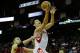 HOUSTON, TX - NOVEMBER 27: Jeremy Lin #7 of the Houston Rockets drives past Jonas Valanciunas #17 of the Toronto Raptors at the Toyota Center on November 27, 2012 in Houston, Texas. NOTE TO USER: User expressly acknowledges and agrees that, by downloading and or using this photograph, User is consenting to the terms and conditions of the Getty Images License Agreement. (Photo by Scott Halleran/Getty Images)