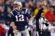 FOXBORO, MA - DECEMBER 10: Tom Brady #12 of the New England Patriots reacts after running the ball for a first down against the Houston Texans in the second half at Gillette Stadium on December 10, 2012 in Foxboro, Massachusetts. (Photo by Jim Rogash/Getty Images)