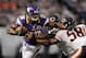 MINNEAPOLIS, MN - DECEMBER 9: Adrian Peterson #28 of the Minnesota Vikings carries the ball against Nick Roach #53 and Dom DeCicco #58 of the Chicago Bears during the fourth quarter of the game on December 9, 2012 at Mall of America Field at the Hubert H. Humphrey Metrodome in Minneapolis, Minnesota. The Vikings defeated the Bears 21-14. (Photo by Hannah Foslien/Getty Images)