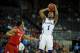 OMAHA, NE - MARCH 16: Naadir Tharpe #1 of the Kansas Jayhawks takes a shot over P.J. Boutte #11 of the Detroit Titans during the second round of the NCAA Mens Basketball Tournament at CenturyLink Center March 16, 2012 in Omaha, Nebraska. (Photo by Eric Francis/Getty Images)