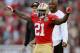 SAN FRANCISCO, CA - DECEMBER 09: Frank Gore #21 of the San Francisco 49ers celebrates after Anthony Dixon scored a touchdown in the fourth quarter against the Miami Dolphins at Candlestick Park on December 9, 2012 in San Francisco, California. The 49ers won the game 27-13. (Photo by Thearon W. Henderson/Getty Images)
