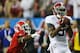 ATLANTA, GA - DECEMBER 01: Wide receiver Amari Cooper #9 of the Alabama Crimson Tide catches a fourth quarter touchdown pass in front of defensive back Damian Swann #5 of the Georgia Bulldogs during the SEC Championship Game at the Georgia Dome on December 1, 2012 in Atlanta, Georgia. (Photo by Mike Ehrmann/Getty Images)