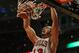 CHICAGO, IL - DECEMBER 08: Joakim Noah #13 of the Chicago Bulls dunks over Tyson Chandler #6 of the New York Knicks at the United Center on December 8, 2012 in Chicago, Illinois. The Bulls defeated the Knicks 93-85. NOTE TO USER: User expressly acknowledges and agrees that, by downloading and or using this photograph, User is consenting to the terms and conditions of the Getty Images License Agreement. (Photo by Jonathan Daniel/Getty Images)