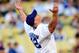LOS ANGELES, CA - AUGUST 20: WWE Superstar John Cena throws the ceremonial first pitch for the Los Angeles Dodgers as they play the Chicago Cubs on August 20, 2009 at Dodger Stadium in Los Angeles, California. (Photo by Jacob de Golish/Getty Images)